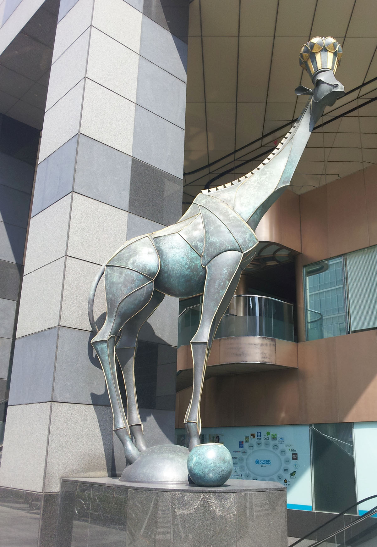 Giraffe wearing a crown near Tokyo Station - Sept. 22, 2013